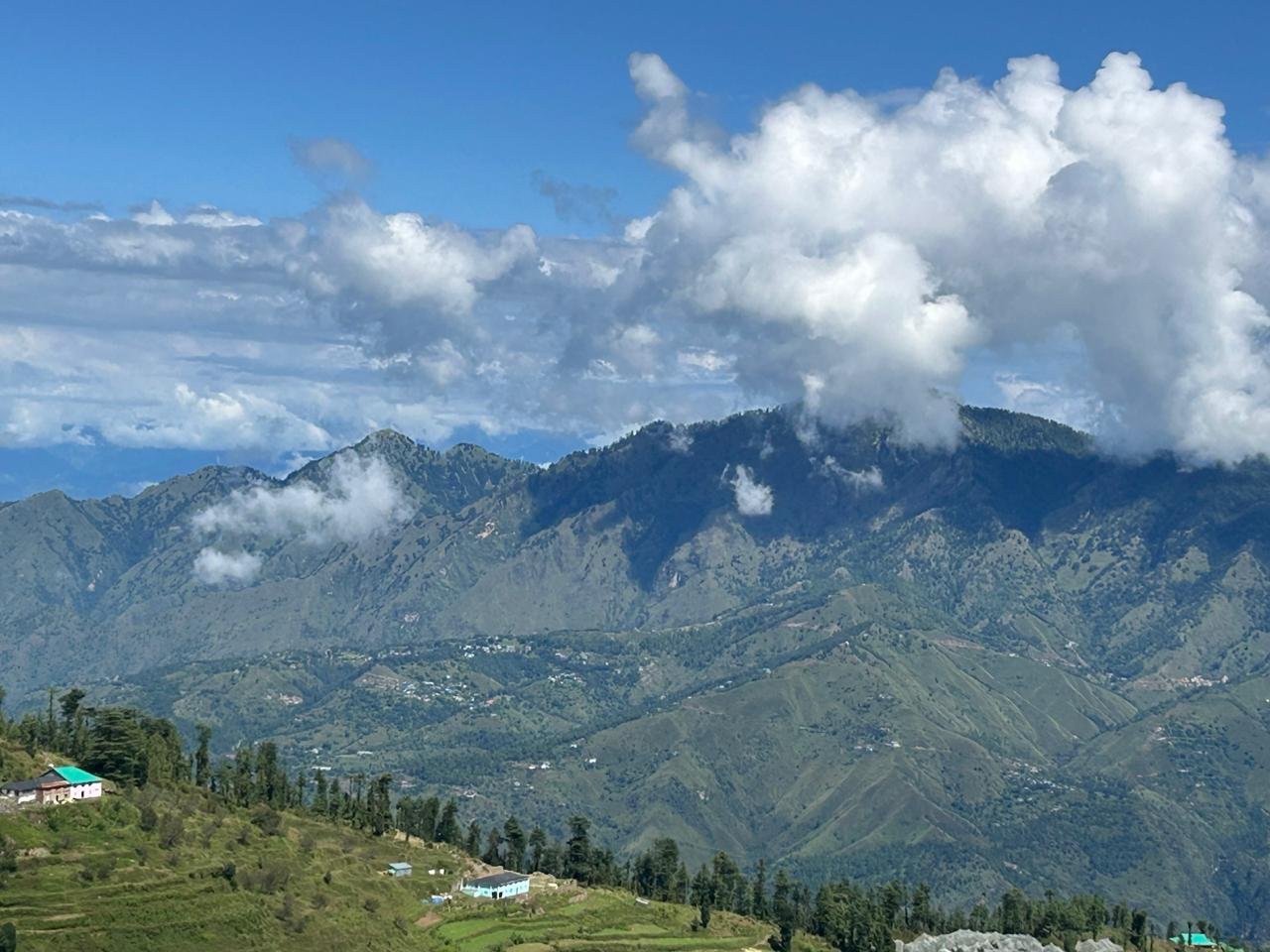 The homestay seen from the far ridge
